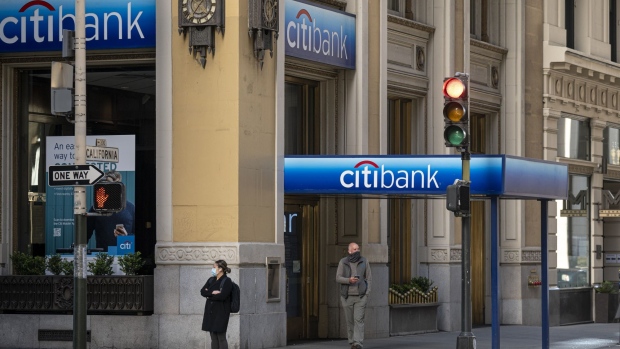 A pedestrian wearing a protective mask walks past a Citibank bank branch in San Francisco, California, U.S., on Tuesday, April 13, 2021. Citigroup Inc. is scheduled to release earnings figures on April 15. Photographer: David Paul Morris/Bloomberg
