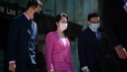 Meng Wanzhou, center, chief financial officer of Huawei Technologies Co., leaves Supreme Court in Vancouver, British Columbia, Canada, on Monday, April 19, 2021. Meng's defense team will ask court to delay upcoming hearings on her U.S. extradition case, Reuters reports, citing the Canadian court and an unidentified person familiar with the matter.