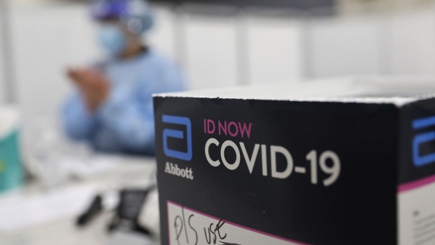 A box of Abbott Laboratories ID NOW rapid test cartridges during a United Airlines Covid-19 test pilot program at Newark Liberty International Airport in Newark, New Jersey.
