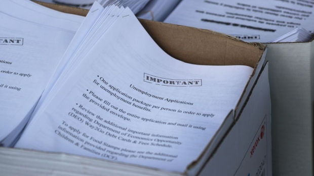 HIALEAH, FLORIDA - APRIL 08: An unemployment application is seen in a box as City of Hialeah employees hand them out to people in front of the John F. Kennedy Library on April 08, 2020 in Hialeah, Florida. The city is distributing the printed unemployment forms to residents as people continue to have issues with access to the state of Florida’s unemployment website in the midst of widespread layoffs due to businesses closing during the coronavirus pandemic. (Photo by Joe Raedle/Getty Images) Photographer: Joe Raedle/Getty Images North America