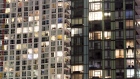 Condominium windows are seen illuminated at night in Toronto, Ontario, Canada.