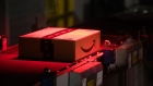 A package is scanned as it moves along a conveyor belt at an Amazon.com Inc. fulfillment center in Kegworth, U.K., on Monday, Oct. 12, 2020. Prime Day, a two-day shopping event Amazon unveiled in 2015 to boost sales during the summer lull, usually occurs in July, but this year got pushed to Oct. 13 in 19 countries, including Brazil, with over 1 million products for sale worldwide. Photographer: Chris Ratcliffe/Bloomberg