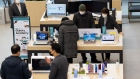 Customers wearing protective masks try out Samsung Electronics Co. Galaxy products at the company's Digital Plaza store in Seoul, South Korea, on Tuesday, Jan. 26, 2021. Samsung is schedule to announce fourth-quarter earning figures on Jan. 28.