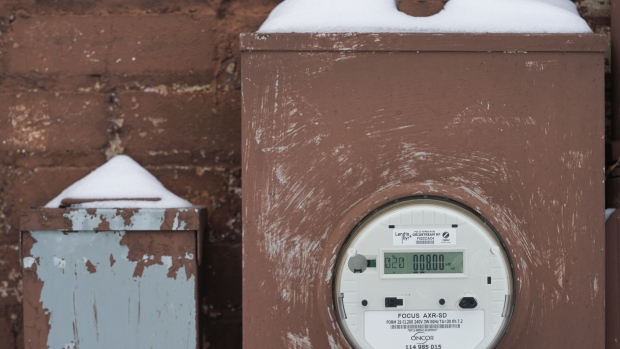An Oncor Electric Delivery Co. electricity meter in McKinney, Texas, U.S., on Tuesday, Feb. 16, 2021. The energy crisis crippling the U.S. showed few signs of abating Tuesday as blackouts left almost 5 million customers without electricity, while refineries and oil wells were shut during unprecedented freezing weather. Photographer: Cooper Neill/Bloomberg