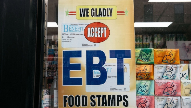 NEW YORK, NY - DECEMBER 05: A sign alerting customers about SNAP food stamps benefits is displayed at a Brooklyn grocery store on December 5, 2019 in New York City. Earlier this week the Trump Administration announced stricter requirements for food stamps benefits that would cut support for nearly 700,000 poor Americans. (Photo by Scott Heins/Getty Images)
