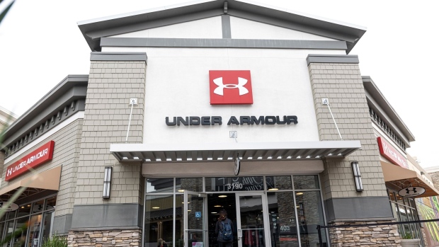 A shopper enters an Under Armour store in Livermore, California, U.S., on Tuesday, Feb. 9, 2021. Under Armour Inc. is scheduled to release earnings figures on February 10. Photographer: David Paul Morris/Bloomberg