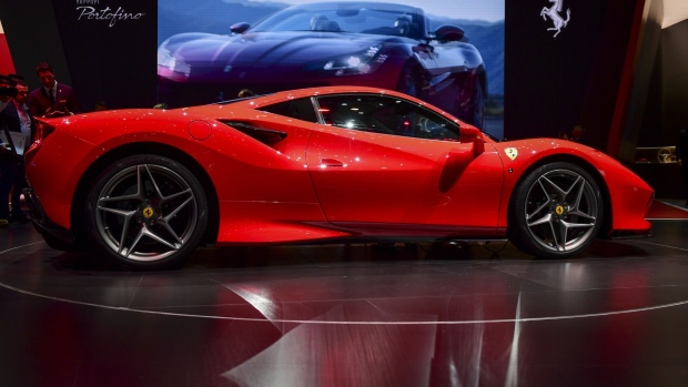 The new Ferrari NV F8 Tributo supercar sits on display on the opening day of the 89th Geneva International Motor Show in Geneva, Switzerland, on Tuesday, March 5, 2019. The show near Lake Leman, which opens to the public from March 7 to 17, will be the first gilded showcase of the year for the likes of Bugatti, Koenigsegg, Lamborghini, and Pininfarina, among others.
