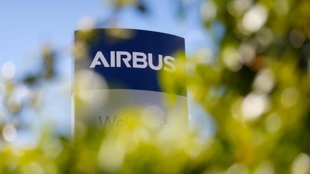 An Airbus logo stands outside the Airbus SE assembly plant in Broughton, U.K., on Thursday, April 30, 2020. Industrial giants like Airbus, Siemens AG and Ford Motor Co. will lend factory floors and supply chain heft to meet government orders for 5,000 ventilator machines of the Smiths Group Plc design, which is already approved by medical authorities, and 15,000 Penlon Ltd. devices. Photographer: Paul Thomas/Bloomberg