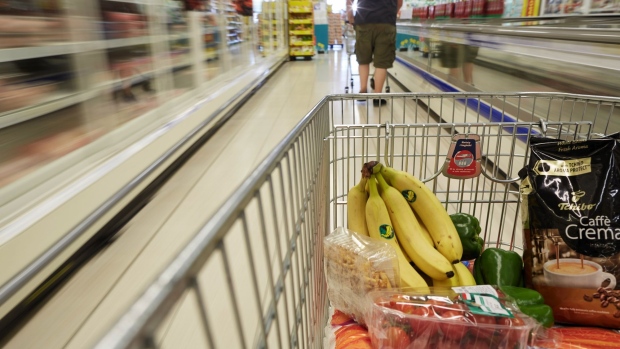 A bunch of bananas and other food products sit in a shopping trolley in a Tesco Plc supermarket in Wroclaw, Poland, on Tuesday, July 14, 2020. Tesco agreed to sell its business in Poland to Danish retailer Salling Group A/S, as the U.K.’s largest supermarket operator focuses on its domestic market in a consumer landscape upturned by the coronavirus. Photographer: Bartek Sadowski/Bloomberg