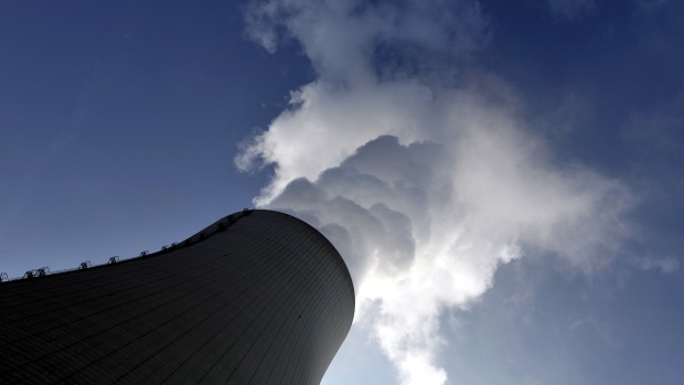 Vapour rises from a cooling tower at the E.ON AG Isar nuclear reactor plant in Essenbach, Germany, on Thursday, Feb. 9, 2011.