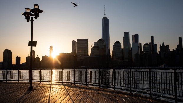 A bird flies over a view of One World Trade Center along the waterfront in Jersey City, New Jersey, U.S., on Monday, April 5, 2021. U.S. futures edged higher while most Asian stocks climbed as investors digested Friday’s unexpectedly strong jobs report. Photographer: Michael Nagle/Bloomberg