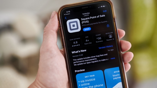 The Square Inc. application for download in the Apple Inc. App Store on a smartphone arranged in Saint Thomas, Virgin Islands, U.S., on Friday, Feb. 19, 2021. Square shed as much as 3.1% on Monday ahead of reporting results on Tuesday postmarket, when investors will be watching for progress on the firm’s Bitcoin and retail trading initiatives.