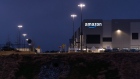Signage outside the Amazon.com Inc. BHM1 Fulfillment Center at night in Bessemer, Alabama, U.S., on Sunday Feb. 7, 2021. The campaign in Bessemer to unionize Amazon workers has drawn national attention and is widely considered a once-in-a-generation opportunity to breach the defenses of the world’s largest online retailer, which has managed to keep unions out of its U.S. operations for a quarter-century.