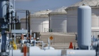 Oil infrastructure stands at the Colonial Pipeline Co. Pelham junction and tank farm in Pelham, Alabama, U.S., on Monday, Sept. 19, 2016. Customers buying gasoline at grocery stores and other independent retailers may pay more than those shopping at name-brand outlets after the biggest gasoline pipeline in the U.S. sprung a leak in Alabama on Sept. 9. Colonial Pipeline Co. has proposed restarting the line on Sept. 22, according to the Alabama Emergency Management Agency. Photographer: Luke Sharrett/Bloomberg