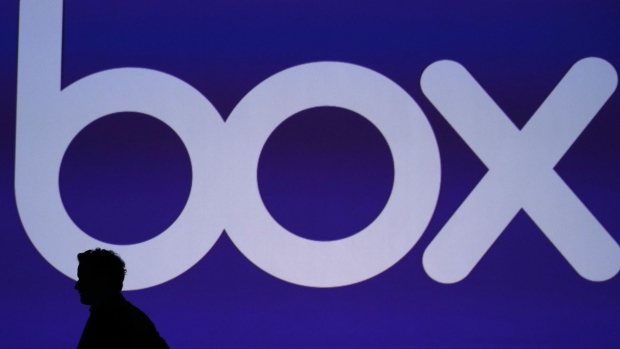 The silhouette of Aaron Levie, chief executive officer and co-founder of Box Inc., is seen on stage during the BoxWorks 2016 Conference at the Moscone Center in San Francisco, California, U.S., on Wednesday, Sept. 7, 2016. Box Inc., trying to expand revenue amid slower billings growth, will unveil new software developed with IBM to help companies set up and manage document-heavy workflows like recruiting, budgeting, sales and customer management. Photographer: Bloomberg/Bloomberg