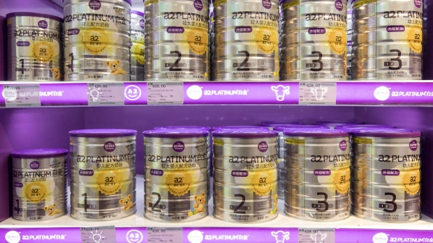 Cans of a2 Milk Co. Platinum infant formula are displayed for sale at a Shanghai Aiyingshi Co. Babemax store in Shanghai, China, on Friday, Dec. 22, 2017. Mother-baby retail chains such as Babemax emerged about a decade ago, mostly near hospitals with big maternity wards, and now account for half of all baby formula sales. Photographer: Qilai Shen/Bloomberg