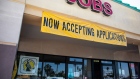 A sign reads "Now Accepting Applications" outside a Labor Systems office in Phoenix, Arizona, U.S., on Sunday, April 25, 2021. The U.S. economy is on a multi-speed track as minorities in some cities find themselves left behind by the overall boom in hiring, according to a Bloomberg analysis of about a dozen metro areas. Photographer: Courtney Pedroza/Bloomberg