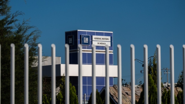 Signage is displayed on a closed General Motors Co. plant in Villa de Reyes, Mexico, on Monday, April 13, 2020. The number of confirmed cases in the coronavirus outbreak in Mexico has risen 7.6% from yesterday to 5,014. Photographer: Mauricio Palos/Bloomberg