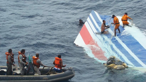 Salvage teams work to retrieve debris from the wreckage of Air France flight 447 off the coast of Brazil in this handout photo taken on Monday, June 8, 2009. The findings, presented by the French BEA air-accident investigation bureau today, show the autopilot and auto-thrust system disengaged shortly after the pilots had alerted cabin crew of possible turbulence ahead.