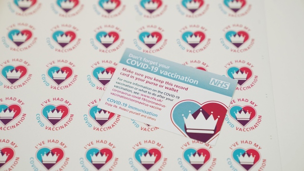 NEWCASTLE, ENGLAND - DECEMBER 08: A Covid-19 vaccination record card and "I've had my covid vaccination" stickers at the Royal Victoria Infirmary at the start of the largest ever immunisation programme in the UK's history on December 8, 2020 in Newcastle, United Kingdom. More than 50 hospitals across England were designated as covid-19 vaccine hubs, the first stage of what will be a lengthy vaccination campaign. NHS staff, over-80s, and care home residents will be among the first to receive the Pfizer/BioNTech vaccine, which recently received emergency approval from the country's health authorities. (Photo by Owen Humphreys - Pool / Getty Images)
