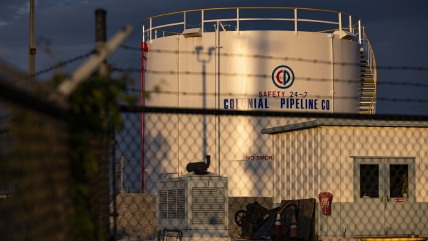 A Colonial Pipeline Co. storage tank at a facility in the Port of Baltimore in Baltimore, Maryland, U.S., on Tuesday, May 11, 2021. Fuel shortages are expanding across several U.S. states in the East Coast and South as filling stations run dry amid the unprecedented pipeline disruption caused by a criminal hack. Photographer: Samuel Corum/Bloomberg