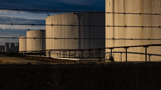 Fuel storage tanks connected to the Colonial Pipeline system in an industrial area of the Port of Baltimore in Baltimore, Maryland, U.S., on Tuesday, May 11, 2021. Fuel shortages are expanding across several U.S. states in the East Coast and South as filling stations run dry amid the unprecedented pipeline disruption caused by a criminal hack.