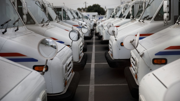 U.S. Postal Service delivery vehicles outside a post office in Torrance, California on Aug. 17.