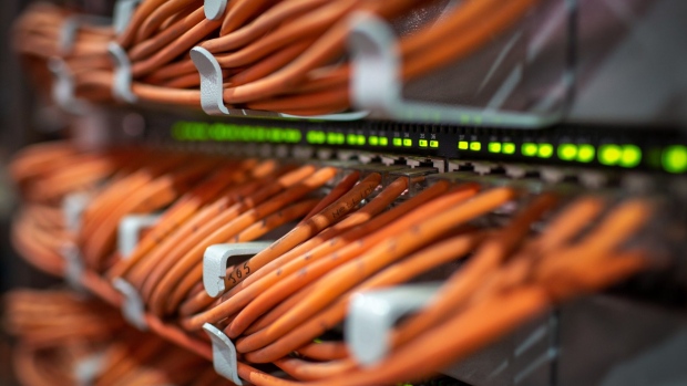 Network cables connect mining rigs to servers at the CryptoUniverse cryptocurrency mining farm in Nadvoitsy, Russia, on Thursday, March 18, 2021. The rise of Bitcoin and other cryptocurrencies has prompted the greatest push yet among central banks to develop their own digital currencies. Photographer: Andrey Rudakov/Bloomberg