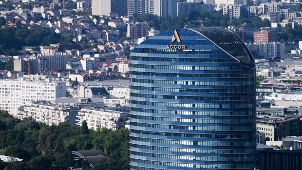 The Accor SA logo sits on the Sequana Tower skyscraper as viewed from the Generali Baloon hot air research balloon as it carries out air quality checks in Paris, France, on Saturday, July 18, 2020. The French state was scolded by judges for failing to properly tackle air pollution and given a six-month ultimatum to clean up or face millions of euros in fines.