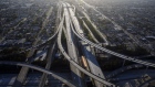 Vehicles drive in light traffic on the Judge Harry Pregerson Interchange between the 105 and 110 freeways in this aerial photograph taken above Los Angeles, California, U.S., on Friday, May 1, 2020. California Governor Gavin Newsom is directing departments to cut spending immediately amid projected deficits of $35 billion, while Los Angeles Mayor Eric Garcetti proposed a budget that calls for civilian workers to take 26 furlough days during the fiscal year that begins in July. Photographer: Patrick T. Fallon/Bloomberg