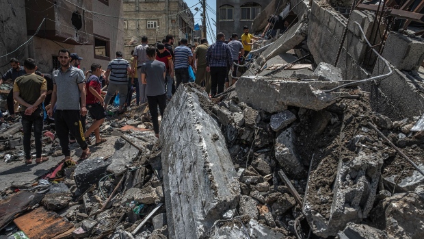 GAZA CITY, GAZA - MAY 20: Palestinians inspect damage to buildings in Gaza City on May 20, 2021 in Gaza City, Gaza.