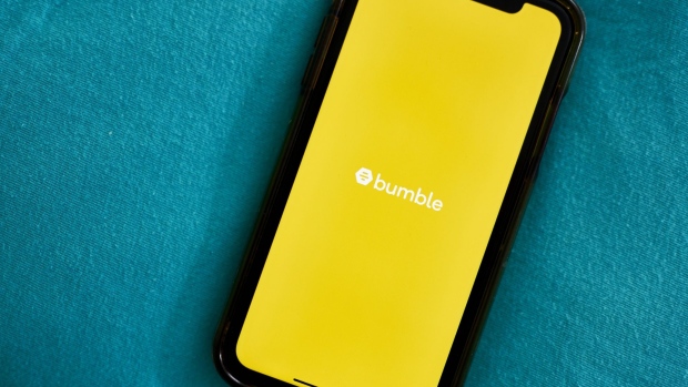 The Bumble Trading Inc. logo on a smartphone arranged in the Brooklyn borough of New York, U.S., on Monday, Jan. 4, 2021. A booming market for U.S. initial public offerings shows no sign of slowing in 2021. Dating app Bumble Trading Inc. has filed confidentially for an IPO that could come as soon as February. Photographer: Gabby Jones/Bloomberg