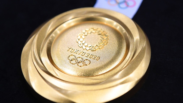 TOKYO, JAPAN - JULY 24: The gold medal is displayed after the Tokyo 2020 medal design unveiling ceremony during Tokyo 2020 Olympic Games "One Year To Go" ceremony at Tokyo International Forum on July 24, 2019 in Tokyo, Japan. (Photo by Atsushi Tomura/Getty Images)