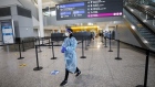 A healthcare worker walks past a mandatory Covid-19 testing area at Pearson airport in Toronto on Feb. 1, after the Canadian government imposed new restrictions on international flights.