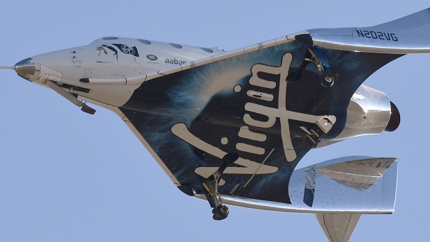 Virgin Galactic's VSS Unity comes in for a landing after its suborbital test flight on December 13, 2018, in Mojave, California. Photographer: Gene Blevins/AFP via Getty Images