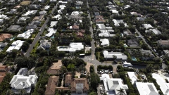 Single-family houses in Palm Beach, Florida, U.S., on Wednesday, April 7, 2021. Purchase contracts for single-family houses priced at $10 million or more surged 306% in March from a year earlier, the biggest gain since the pandemic started, appraiser Miller Samuel Inc. and brokerage Douglas Elliman Real Estate said in a report. Photographer: Marco Bello/Bloomberg