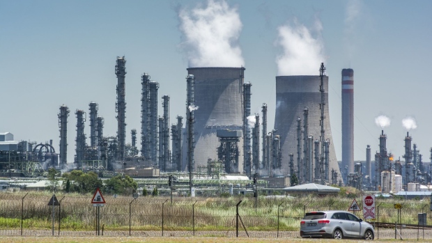 Vapour rises from the cooling towers of the Sasol Ltd. Secunda coal-to-liquids plant in Mpumalanga, South Africa.