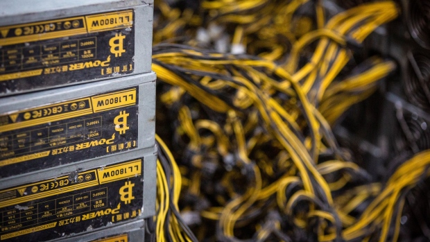 Mining rig power supply units at the CryptoUniverse cryptocurrency mining farm in Nadvoitsy, Russia, on Thursday, March 18, 2021. The rise of Bitcoin and other cryptocurrencies has prompted the greatest push yet among central banks to develop their own digital currencies. Photographer: Andrey Rudakov/Bloomberg