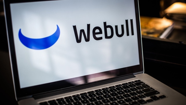 The Wellbull Financial LLC logo on a laptop computer arranged in Dobbs Ferry, New York, U.S., on Saturday, Jan. 30, 2021. The backlash over trading restrictions imposed by Robinhood Markets may be driving customers to one of the brokerage’s fastest-growing rivals, Webull Financial. Photographer: Tiffany Hagler-Geard/Bloomberg