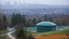An oil tank stands near the Kinder Morgan Inc. Trans Mountain pipeline expansion site in Burnaby, British Columbia, Canada, on Wednesday, April 11, 2018.