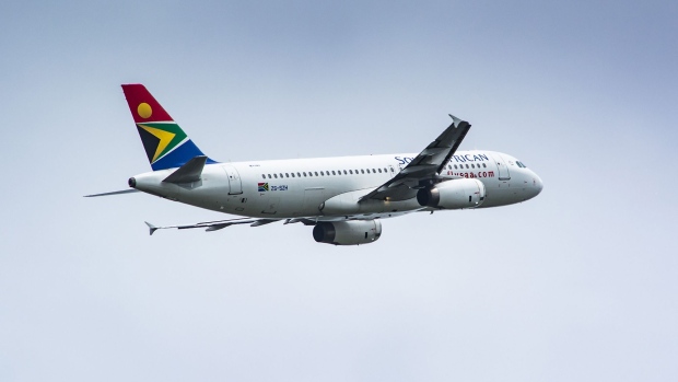 An Airbus A320-200 passenger jet, operated by South African Airlines (SAA), takes off from O.R. Tambo International Airport in Johannesburg. Photographer: Waldo Swiegers/Bloomberg
