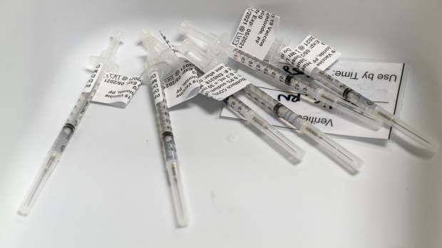 Syringes filled with doses of the Pfizer-BioNTech Covid-19 vaccine at a large scale vaccination site in Sacramento, California.