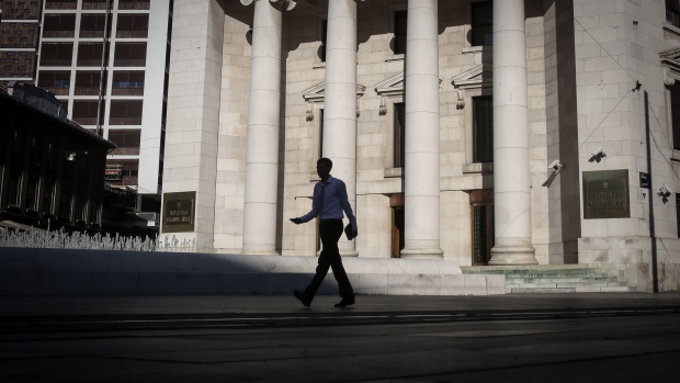 A pedestrian passes the Hrvatska Narodna Banka (HNB), Croatian National Bank, headquarters in Zagreb, Croatia, on Thursday, Aug. 20, 2020. The Adriatic nation and Bulgaria got the green light to join the pre-euro currency system last month, and now have at least two more years to prove they can comfortably meet membership requirements before making the switch. Photographer: Oliver Bunic/Bloomberg