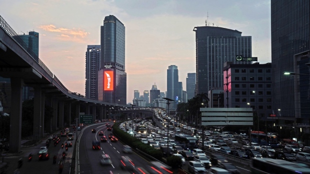 Vehicles sit in traffic on a highway in Jakarta, Indonesia, on Tuesday, March 16, 2021. Indonesia is pursuing another attempt at increasing government influence in the decision-making and operations of its central bank, as well as expanding its ability to fund public debt, according to a draft legislation to be discussed in parliament.