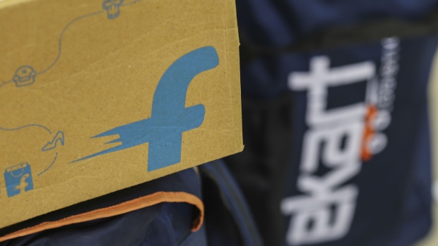 The logo of Flipkart Online Services Pvt is seen on the side of a package at the company's office in the Jayaprakash Narayan Nagar area of Bengaluru, India, on Wednesday, Oct. 26, 2016. Flipkart, India's largest and most valuable e-commerce company, is against domestic rival Snapdeal.com and U.S. leviathan Amazon.com Inc., all tussling for dominance in a market that Morgan Stanley expects to explode more than ten-fold to $137 billion by 2020 from $11 billion in 2013. Photographer: DHIRAJ SINGH/Bloomberg