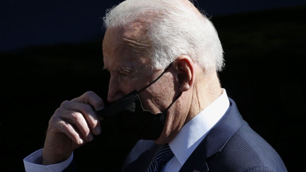U.S. President Joe Biden, adjusts his face mask after attending a Sunday service at Sacred Heart and St. Ia Catholic Church in St Ives on the final day of the Group of Seven leaders summit in Carbis Bay, U.K., on Sunday, June 13, 2021. The world’s richest governments are under mounting pressure to help poor countries fight climate change.