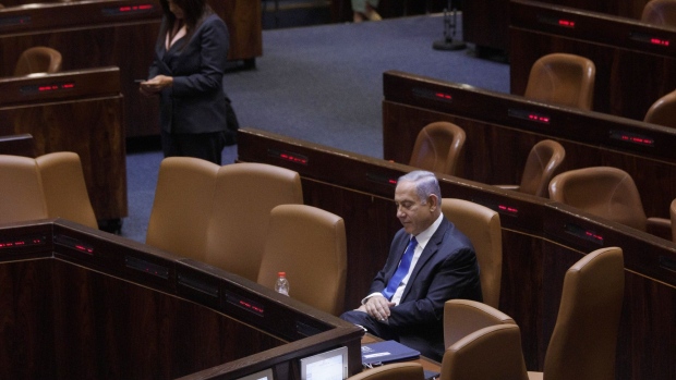 Benjamin Netanyahu, Israel's prime minister and the leader of the Likud party, waits to speak at the Knesset in Jerusalem, Israel, on Sunday, June 13, 2021. Netanyahu’s record-setting run as Israeli leader approached a precipice Sunday as lawmakers prepared to approve or reject the opposition’s proposed government, a coalition that runs the gamut of Israeli politics but united in the desire to oust him and end more than two years of political turmoil.