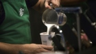 A barista pours frothed milk into a drink inside a Starbucks Corp. coffee shop in New York. Photographer: Victor J. Blue/Bloomberg