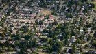 Homes in Victoria, British Columbia, Canada, on Thursday, June 10, 2021. Households that own their home accounted for almost all of the gains in the first quarter, C$730 billion, while the wealth of renters was up just C$43 billion. Photographer: James MacDonald/Bloomberg