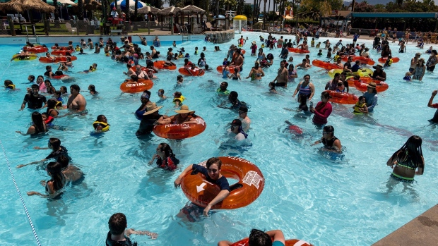 People cool off at a water park in Concord, California during the heatwave.